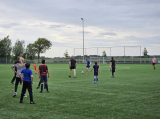 Laatste training S.K.N.W.K. JO11-1JM (partijtje tegen de ouders) van maandag 27 mei 2024 (51/137)